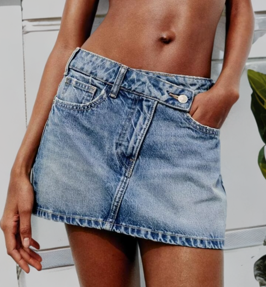 low rise asymmetric denim mini skirt